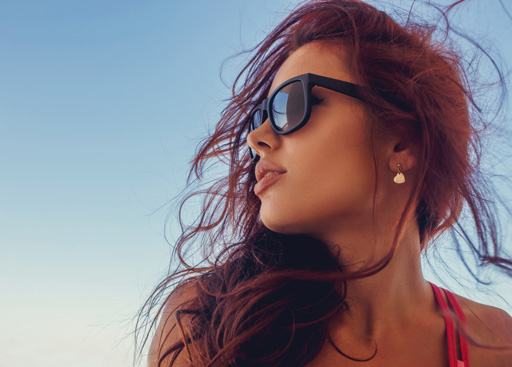 woman hiking with nice sunglasses